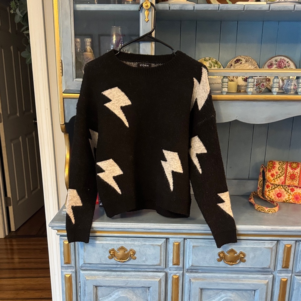Storia Black Crewneck Sweater with Cream Lightning Bolts - Picture 1 of 3